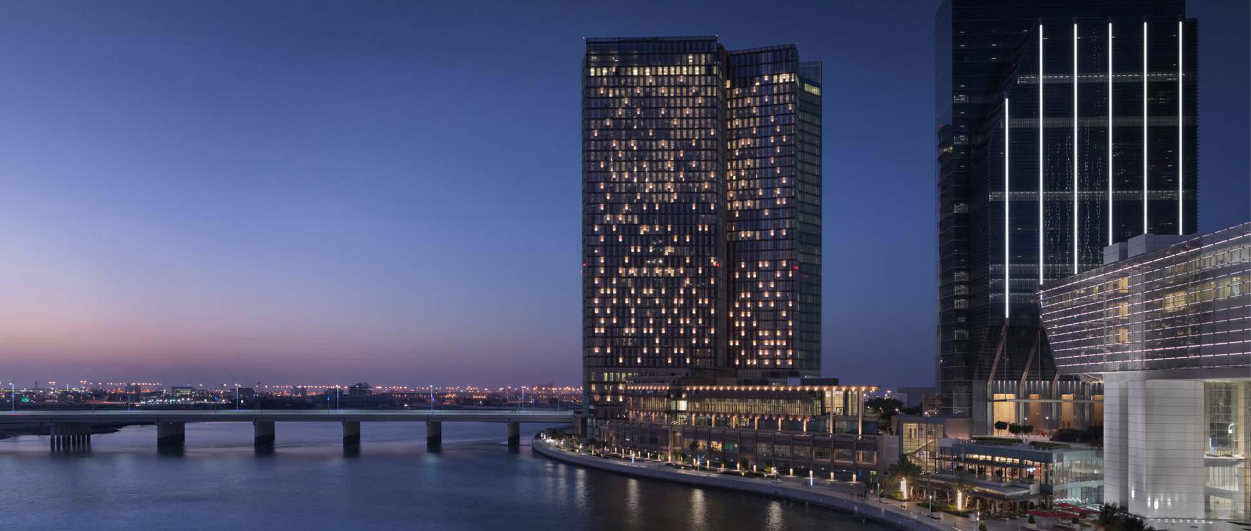 Panoramic waterfront view of Four Seasons Hotel & Private Residences on Al Maryah Island, Abu Dhabi, showcasing luxury community living and skyline vistas