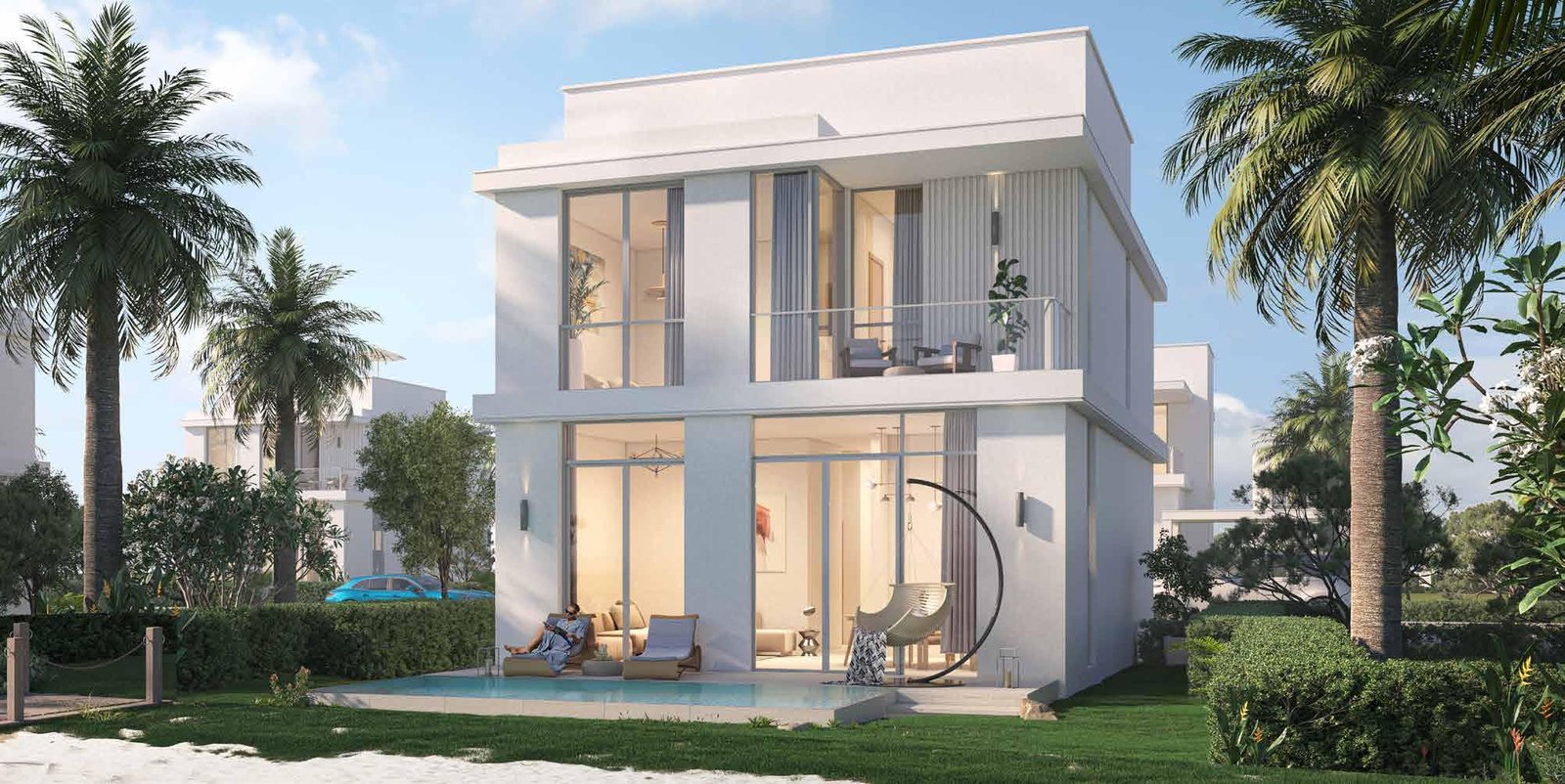 View of Ramhan Island with illuminated residences and a peaceful coastal atmosphere.
