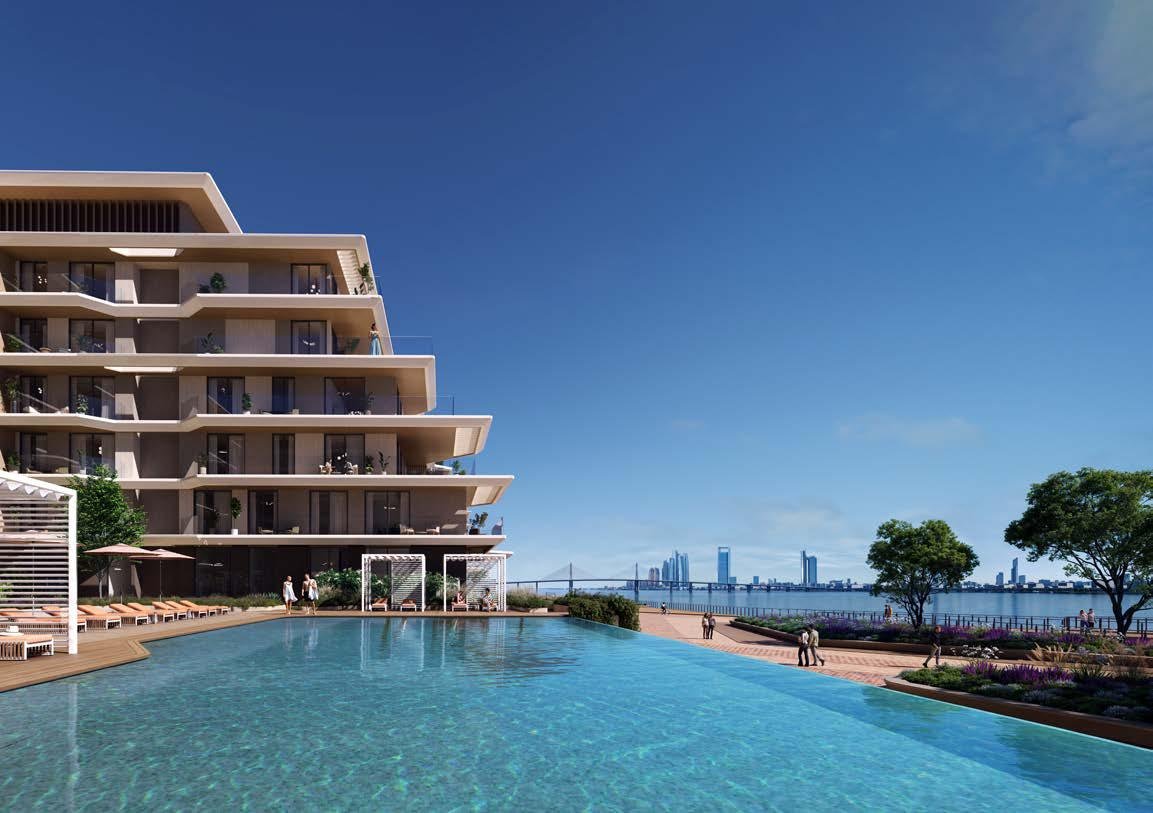 Serene waterfront promenade near Bashayer Residences with landscaped pathways, parks, and leisure walkways on Hudayriyat Island.